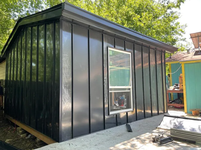 Black standing seam metal wall panels for Roof Inspection in Connerton