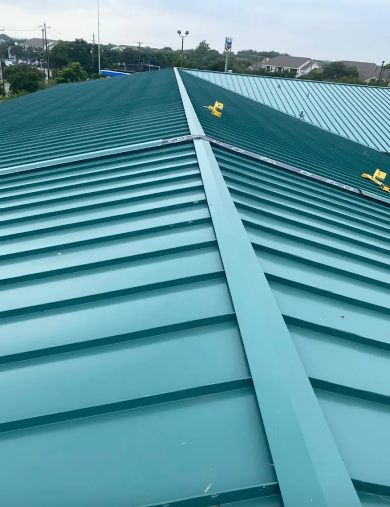 Green commercial metal roof ridge and valley for Metal Roof Repair in Connerton